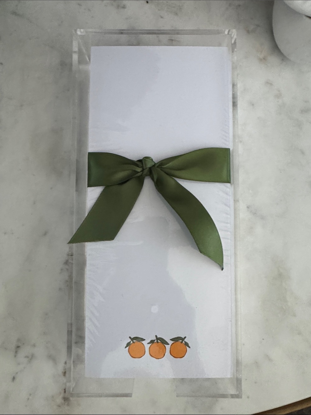 White Notepad with Orange Fruit Motif and Olive Green Bow